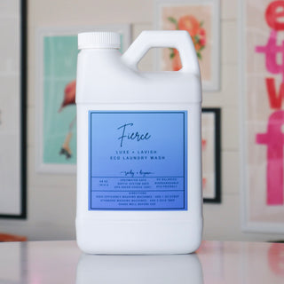 White laundry detergent container with a blue label, titled 'Fierce'. 