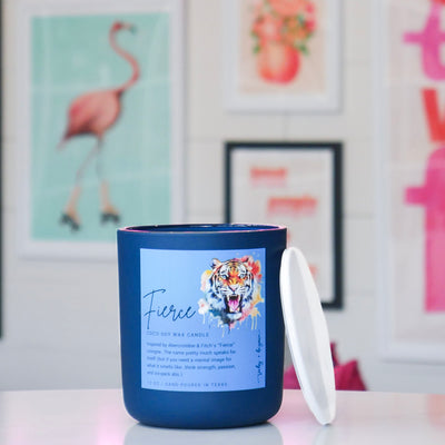 Blue candle with a light blue label featuring a tiger, titled 'Fierce'. 