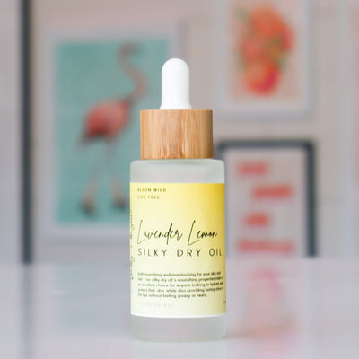 Silky dry oil bottle with a wooden dropper, labeled 'Lavender Lemon'. 