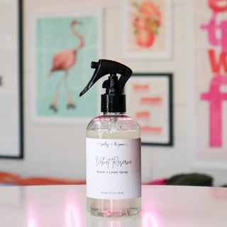 Bottle of room & linen spray labeled 'Velvet Reserve'.