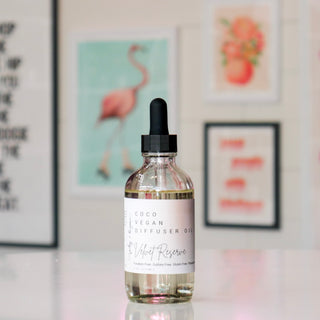 Bottle of coco vegan diffuser oil with dropper, labeled 'Velvet Reserve'.