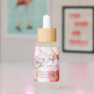 Silky dry oil bottle with floral design, labeled Yours Truly.