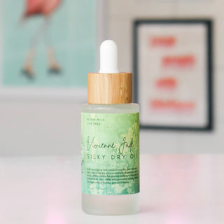 Silky Dry Oil dropper bottle with a green label, titled Vivienne Jade. 