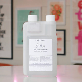 Mop soap concentrate with a white label, titled 'Goddess'. 