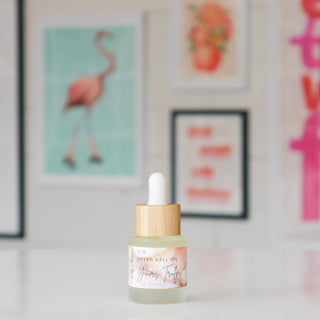 Small dropper bottle of Dryer Ball Oil with a floral design, labeled Yours Truly.