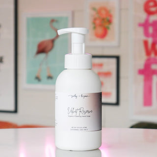 Foaming hand soap bottle labeled 'Velvet Reserve'.