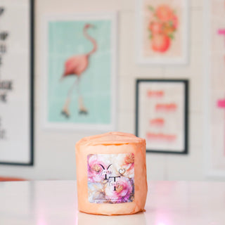 Candle wrapped decorative paper, labeled Yours Truly.