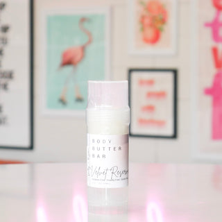 Body butter bar labeled 'Velvet Reserve'.