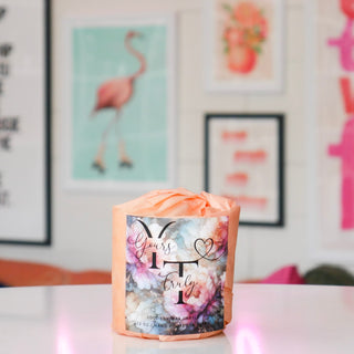 Candle wrapped in decorative packaging, labeled Yours Truly.