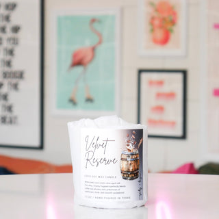Candle refill labeled 'Velvet Reserve' wrapped in white paper.
