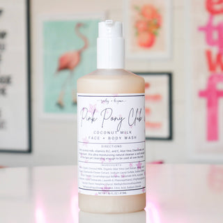 Coconut milk face & body wash with a white label, titled 'Pink Pony Club'.